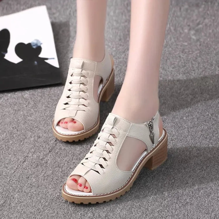 Women's retro-style sandals with a side zipper in a pure colour on a beef tendon sole.