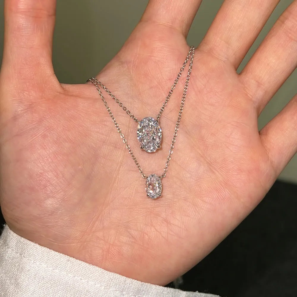 Women's S925 sterling silver necklace with oval ice flower pendant in platinum or gold finish