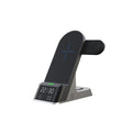Black multifunctional alarm clock with digital display and wireless charging pad for smartphone, Apple Watch, and earphones.