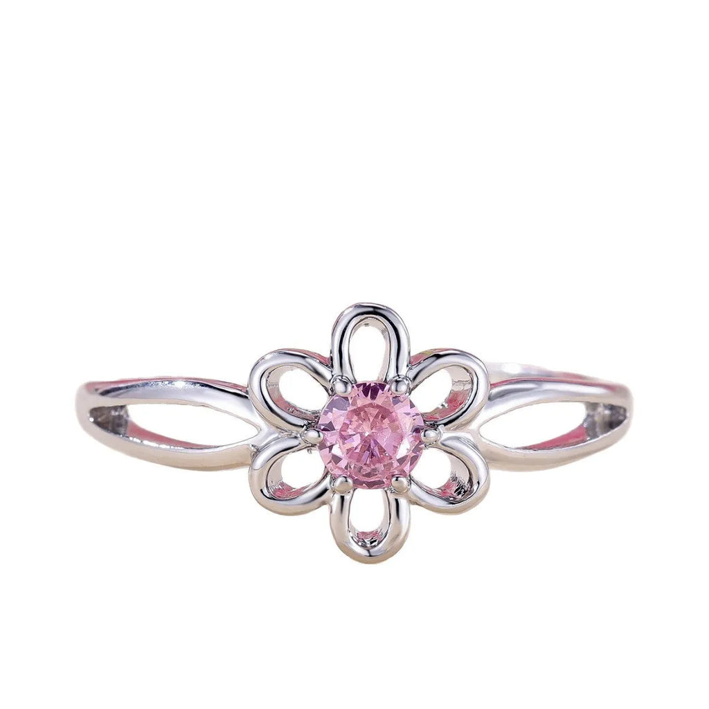 Women's hollow floral fashion ring in copper with electroplated finish, shown in platinum pink diamond colour.