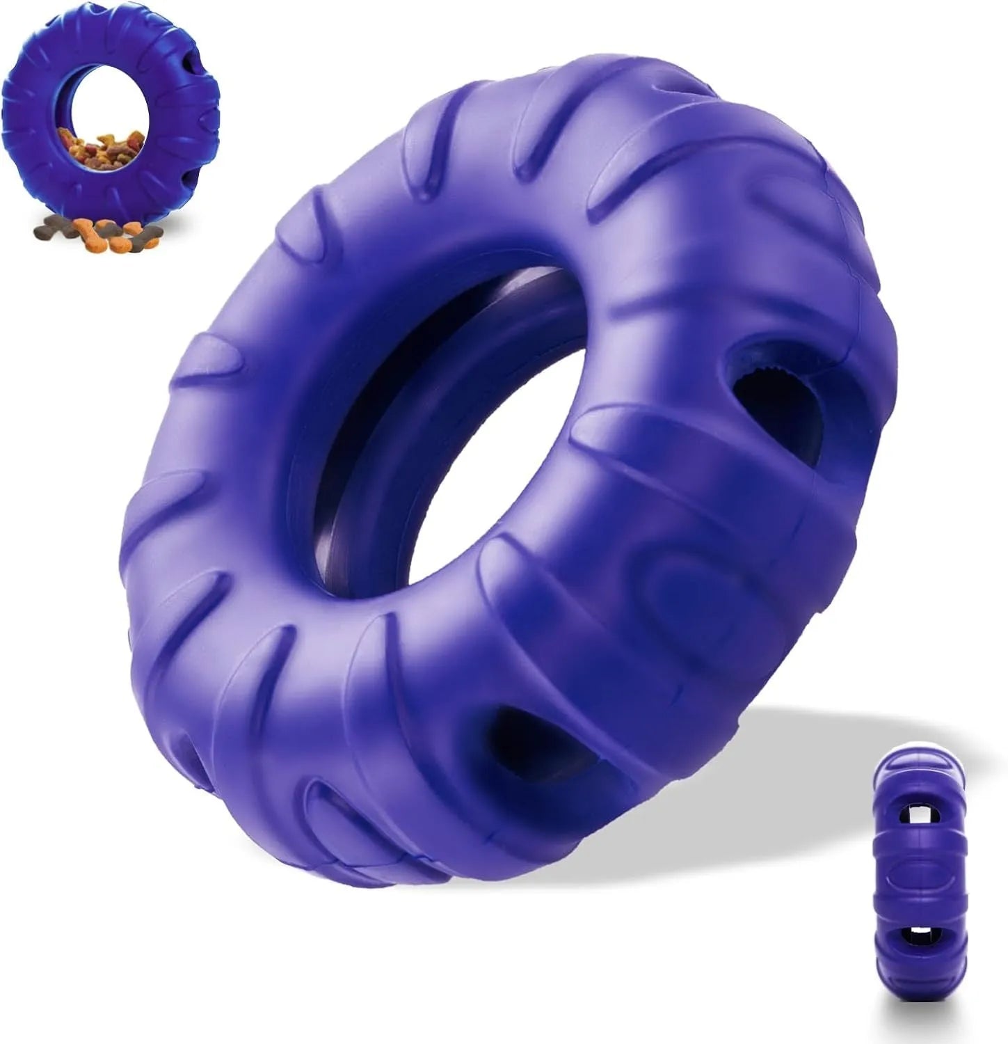 Blue rubber tyre-shaped dog chew toy and slow feeder with oval openings on a wooden floor.