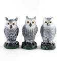 Three artificial plastic owls in red or white for garden pest control, each 20cm tall