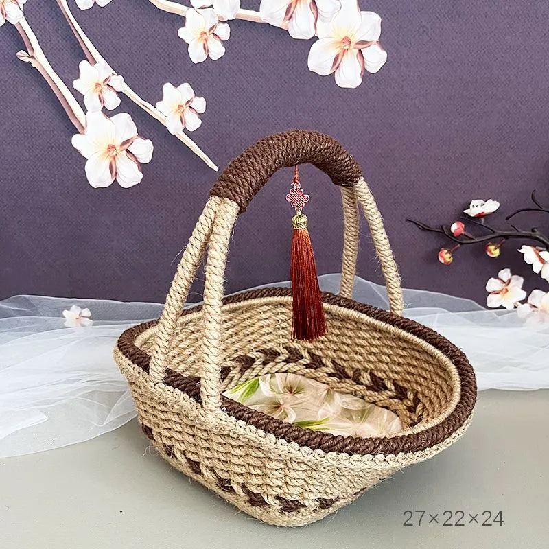 Hand-woven straw basket with hemp rope detailing in rustic farmhouse style