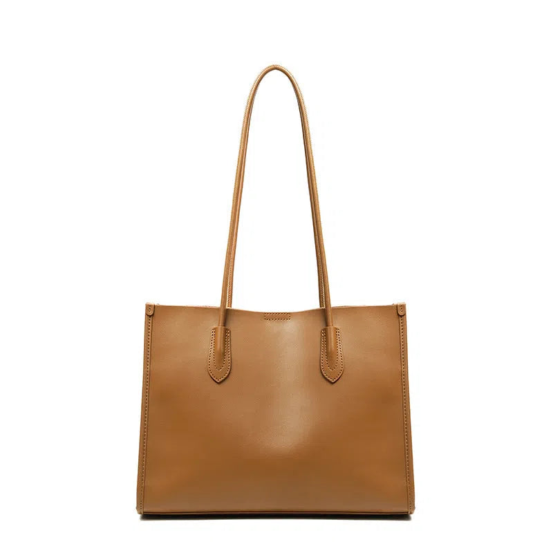Women's genuine leather commuter tote bag in golden brown with double straps and stitching detail