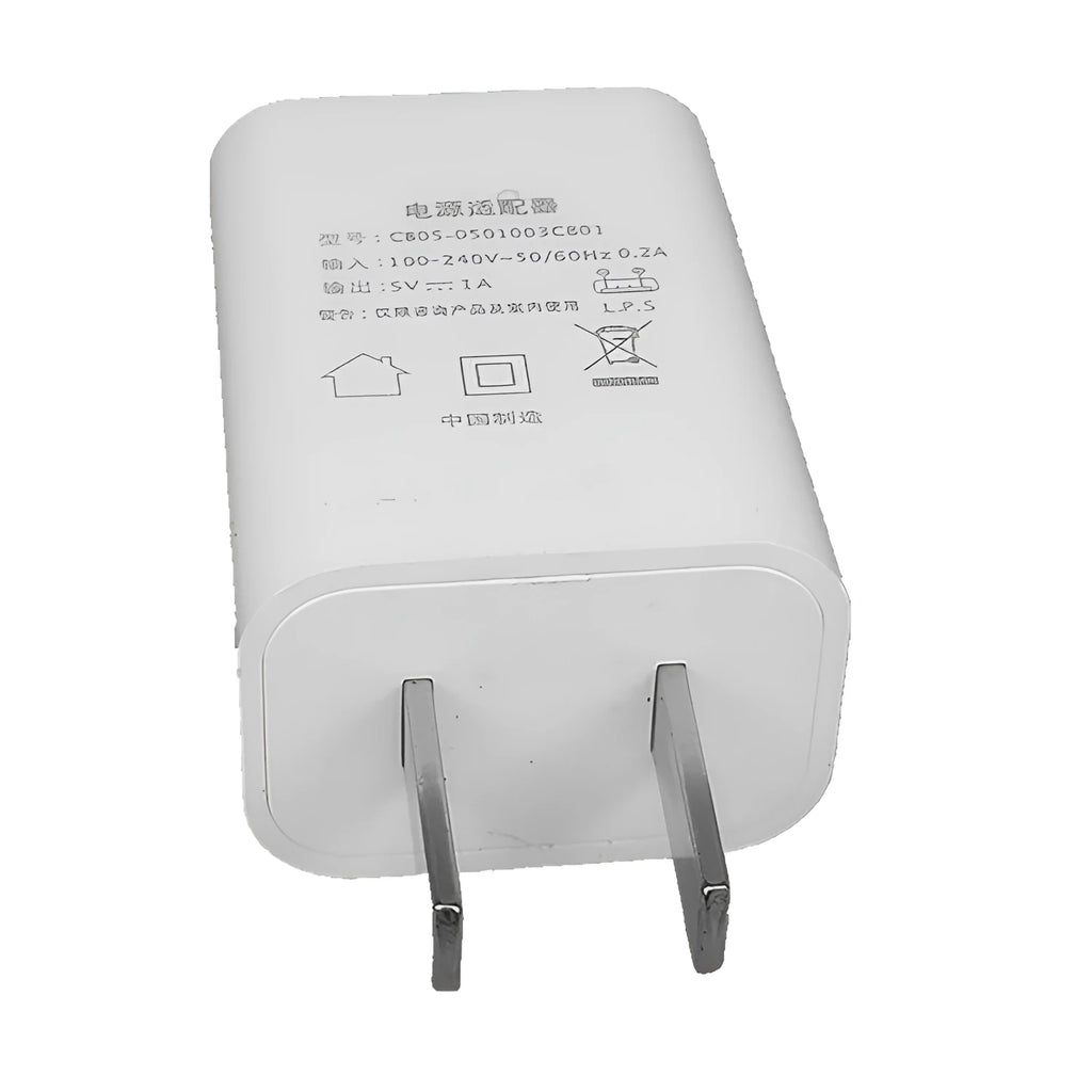 Slim white USB wall charger with 5V 1A output for mobile phones.