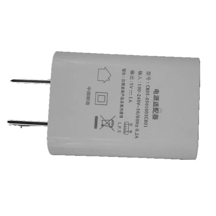 Slim white USB wall charger with 5V 1A output for mobile phones.