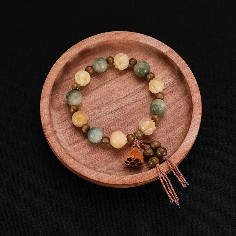 Carved pumpkin lotus Bodhi root bracelet with white jade beads and multiple dimensions