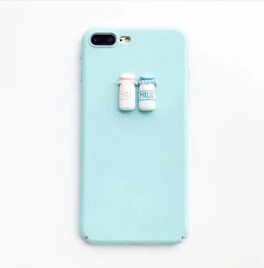 Soft silicone iPhone case with a raised 3D cartoon cat design, shown in pink.