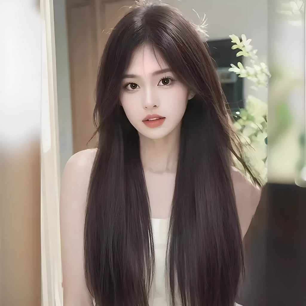 Long straight black synthetic wig with side bangs on a wig head, showing full-head construction.