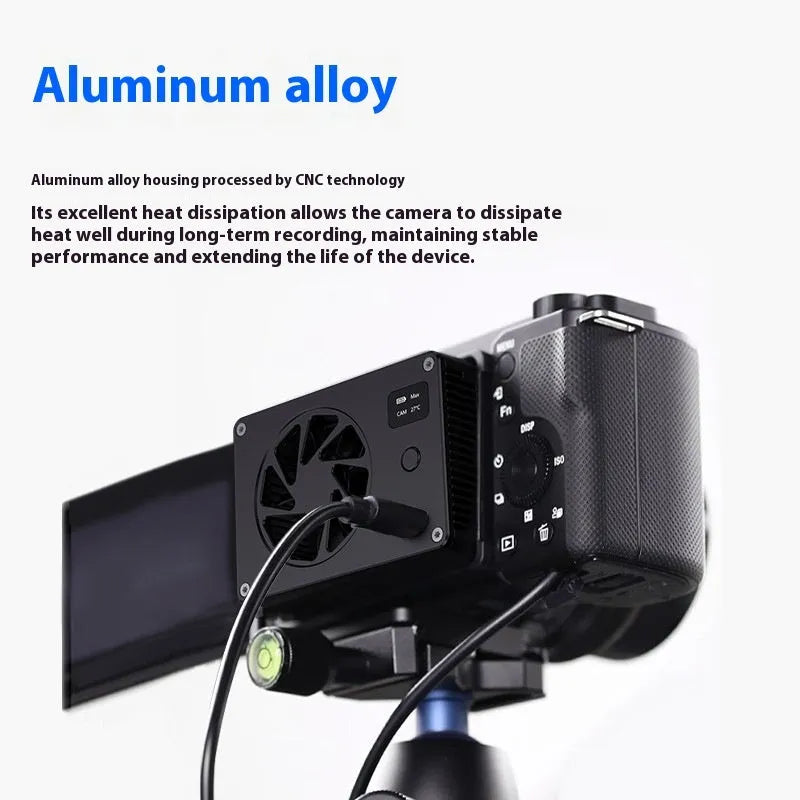 Black aluminium computer cooling radiator measuring 89mm x 52mm with attached power cord