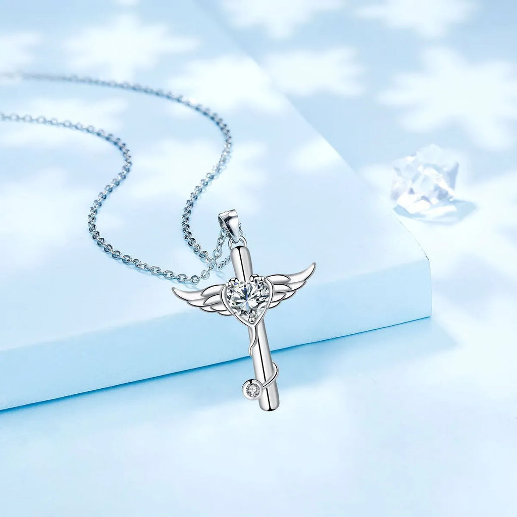 Stethoscope necklace with wings cross pendant on 45cm chain, available in white diamond or red diamond colour options