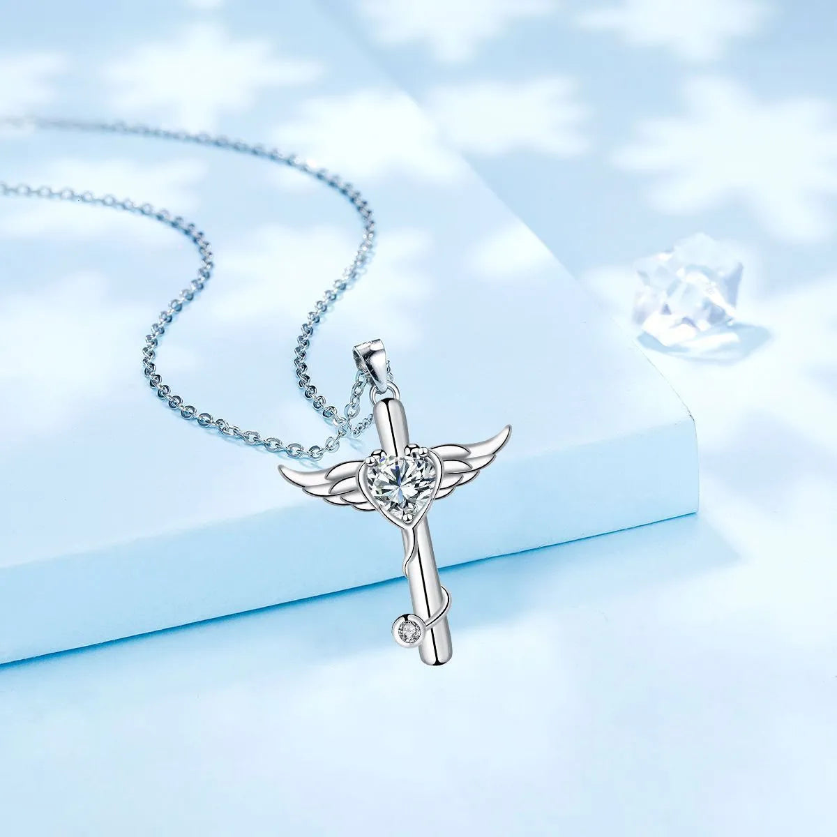 Stethoscope necklace with wings cross pendant on 45cm chain, available in white diamond or red diamond colour options