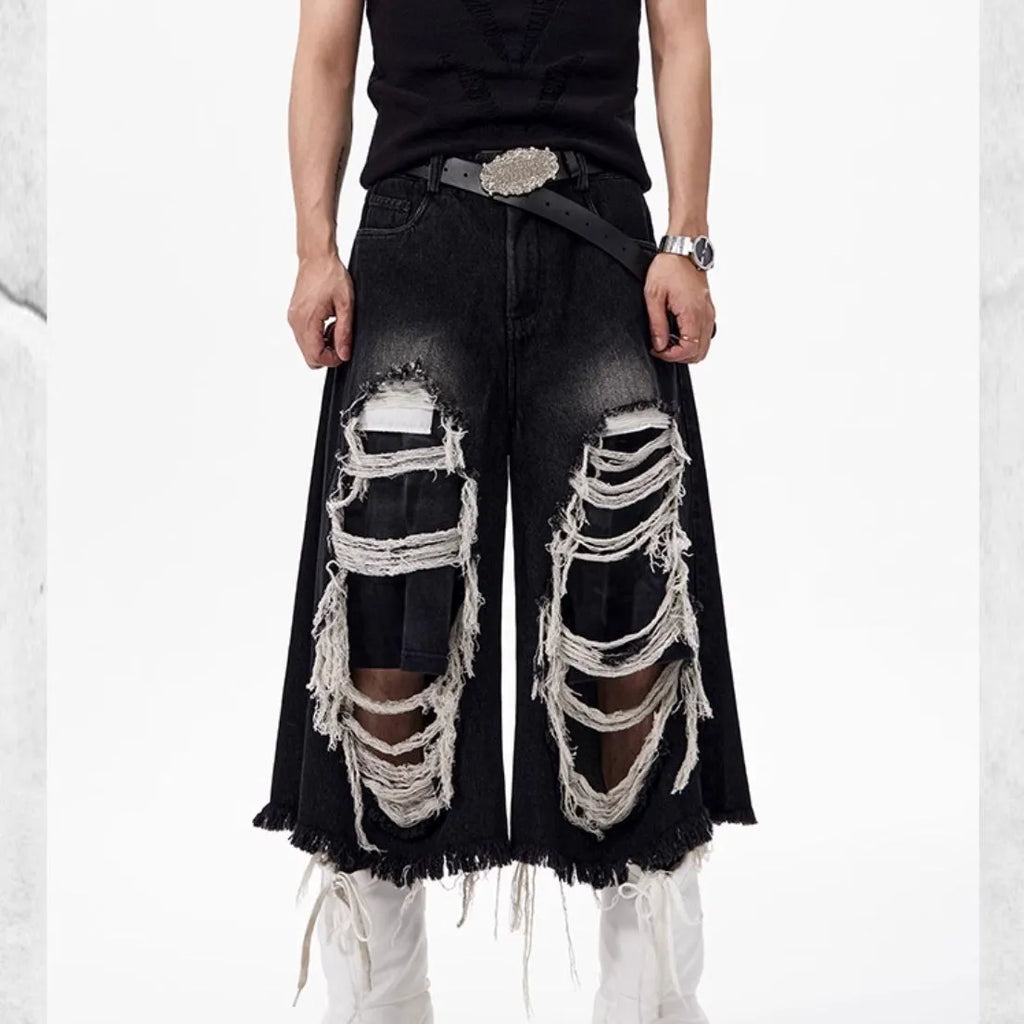 Black loose wide leg cropped jeans with mid-high waist made from cotton denim fabric
