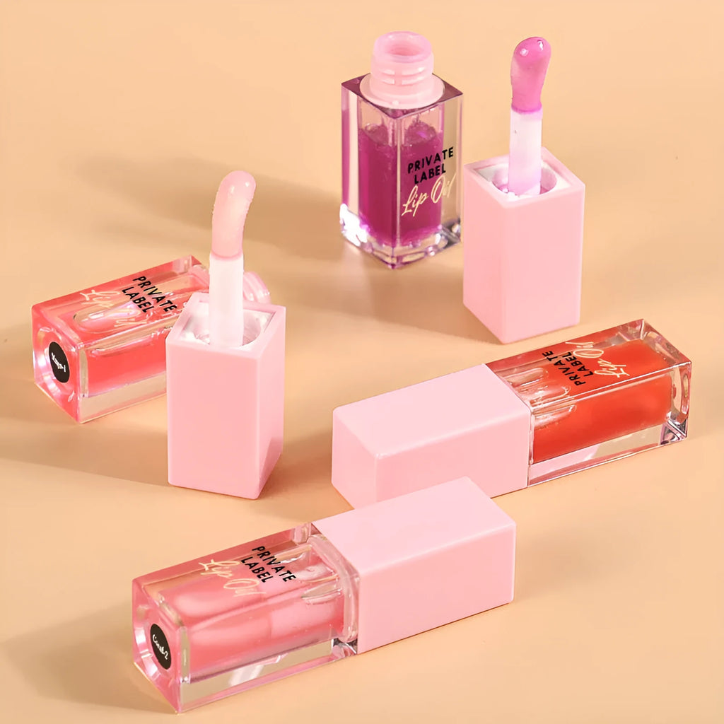 Women's transparent lip gloss tube in six sheer shade options including bird of paradise, cherry, coral, mango, strawberry and watermelon