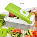 Green 12-piece manual vegetable chopper set with stainless steel blades on kitchen counter
