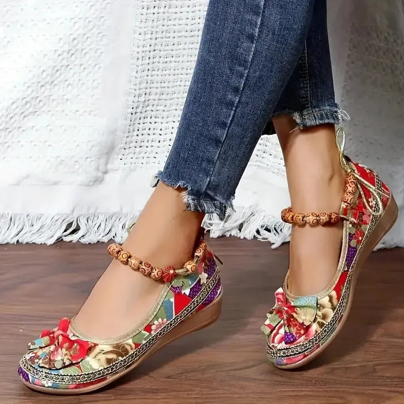 Women's plus size ethnic platform sandals with cloth upper, elastic band, and round toe in black or red
