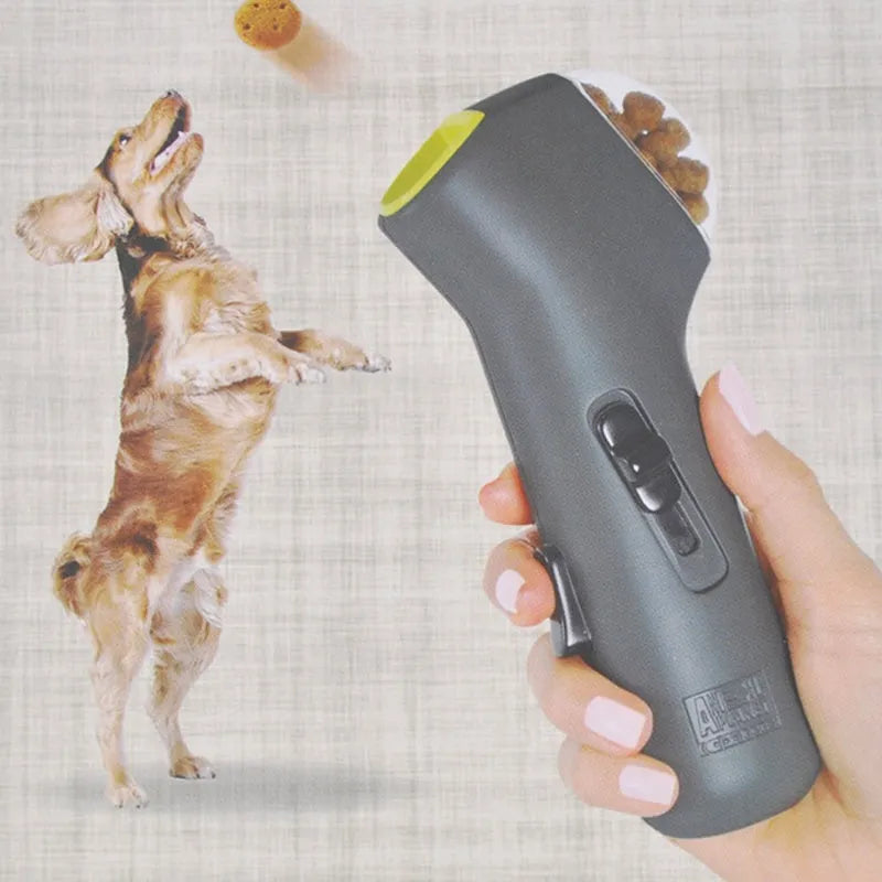 Grey plastic pet snack launcher toy measuring 18cm long for dog and cat treat dispensing.