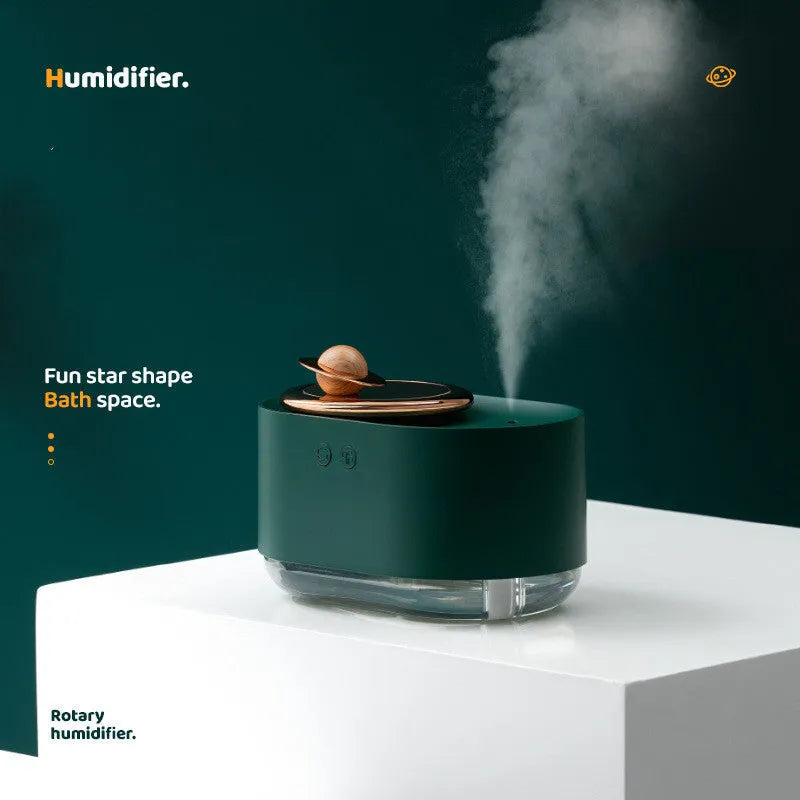 Rotating planet-shaped humidifier with USB charging cable and night light function