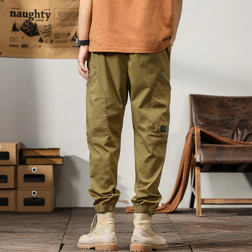 Men's cotton tapered harem pants with ankle banding in black, coffee, khaki or peacock green
