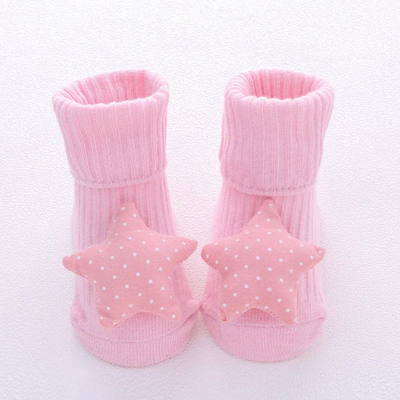 Cotton baby floor socks in blue bow pattern for infants 0-3 months.