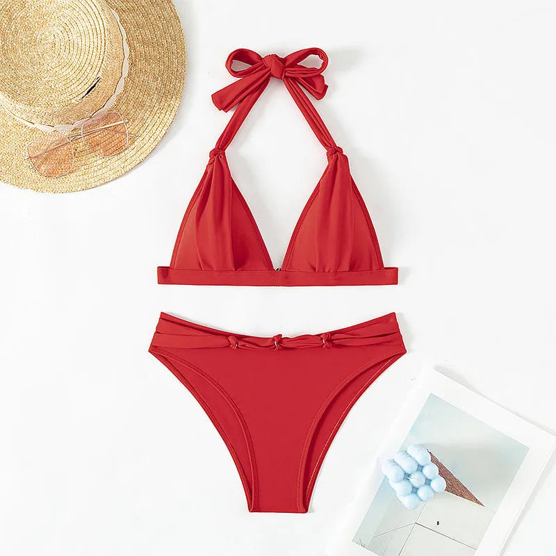 Red women's bikini with lace-up halterneck and split shorts