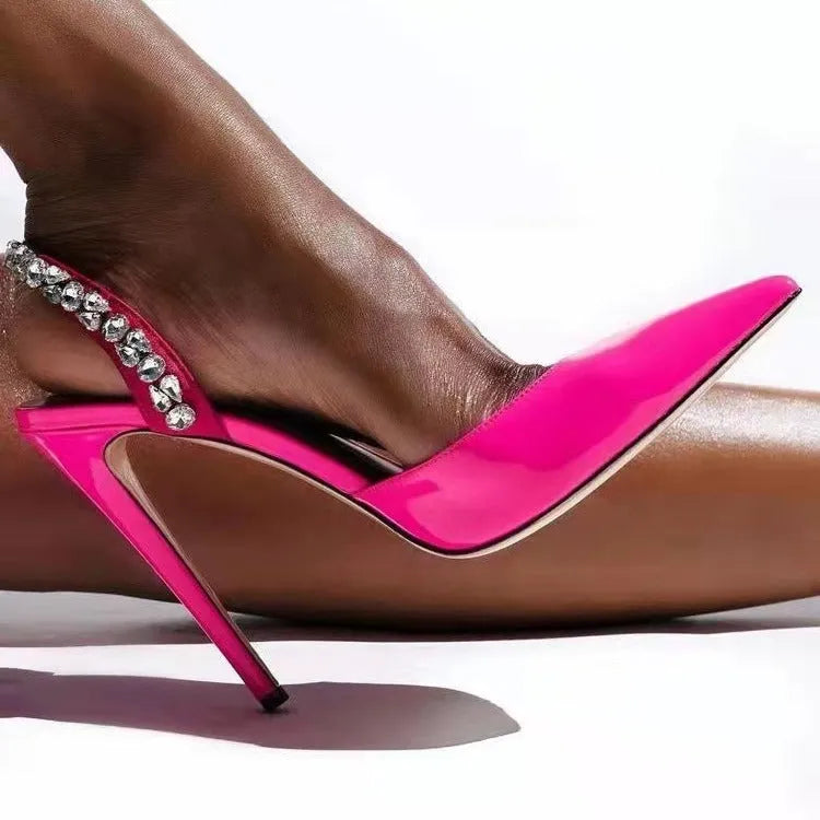 Pointed toe high heel sandals with rhinestone decoration on the side, shown in patent leather red with an 11cm heel.