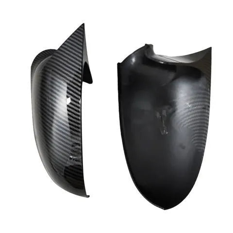 Pair of plastic mirror housings for Volkswagen Sagitar (2006-2011) in black and carbon fibre finishes.