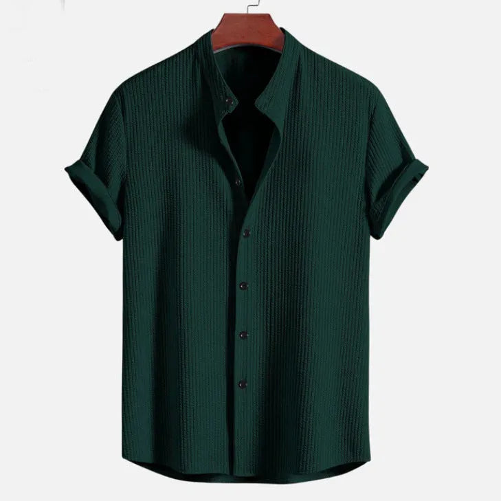 Men's short sleeve loose shirt in polyester fabric available in multiple colours including black, white and navy blue