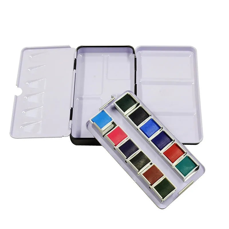 Solid tinplate folding paint box for watercolour paints shown in square shape.