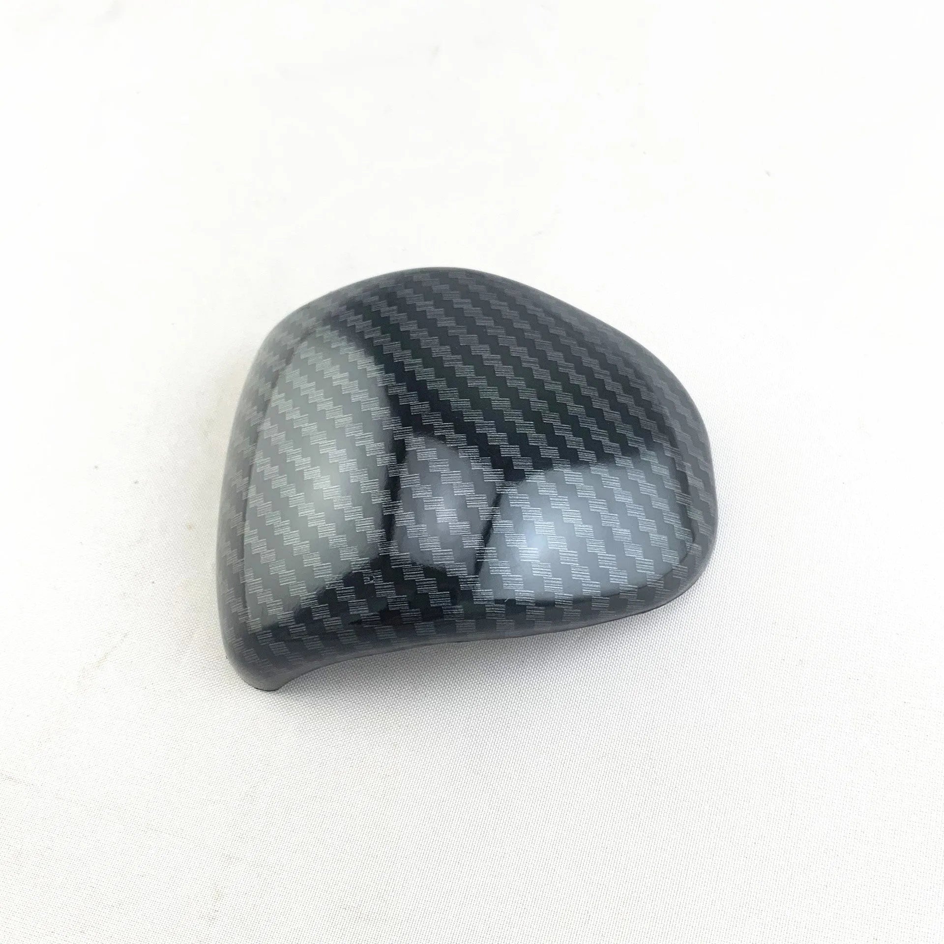 Black carbon fibre pattern gear shift head cover for Smart RunK3 car interior.