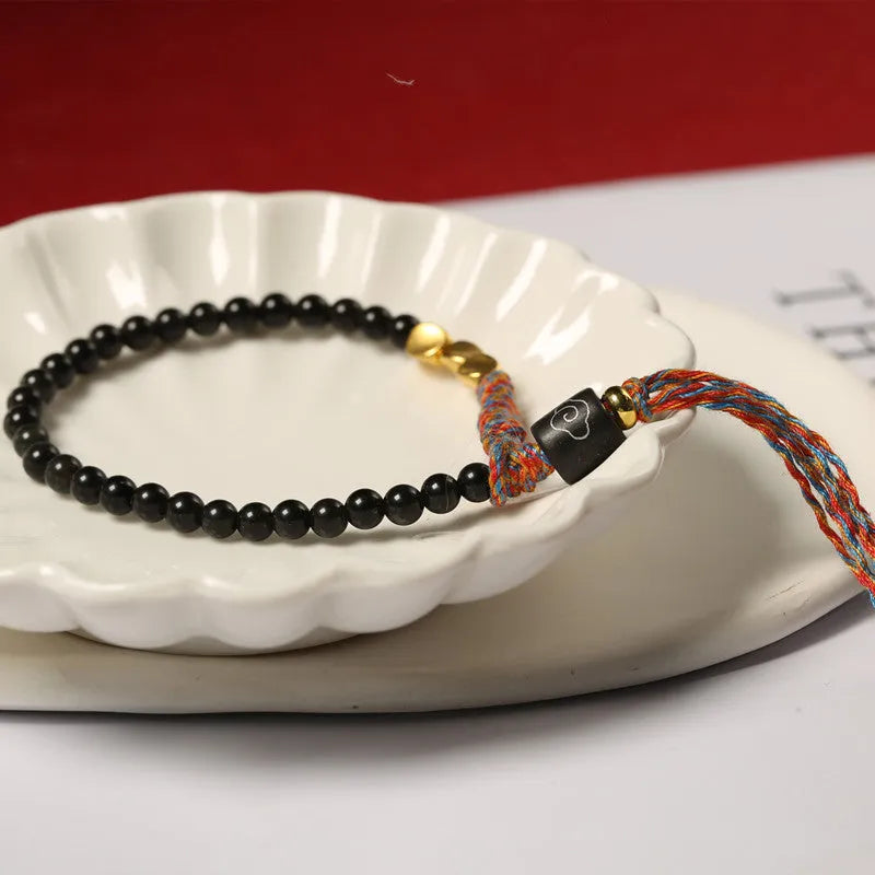 Hand-woven obsidian bracelet with 4mm width and 15.5-16cm adjustable length