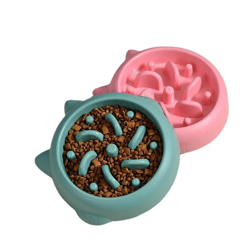 Green bone-shaped slow feeder bowl for dogs to prevent fast eating and choking.