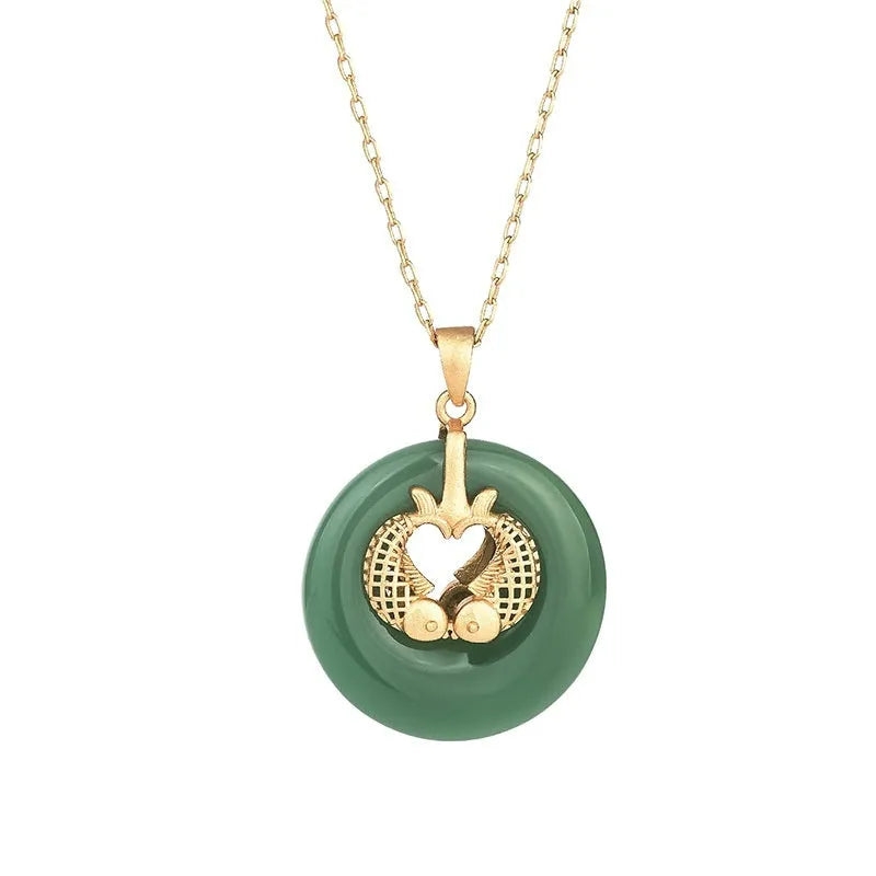 Gold koi animal zodiac necklace with green inlay pendant on adjustable chain