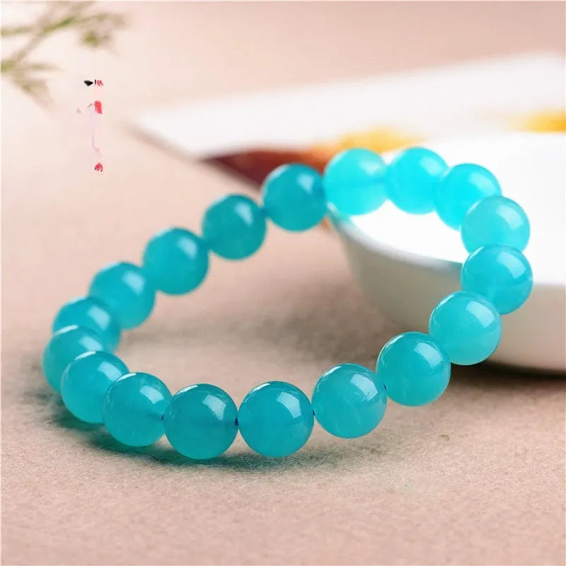 Natural Amazonite scattered beads bracelet with polished finish in ice blue-green colour