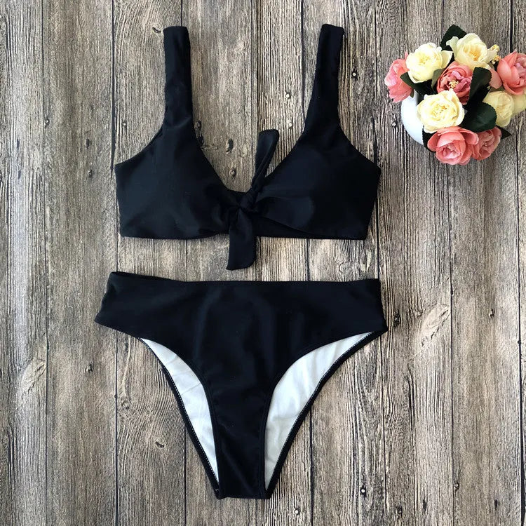 Women's solid colour bikini set in polyester, shown in one of five available colours.
