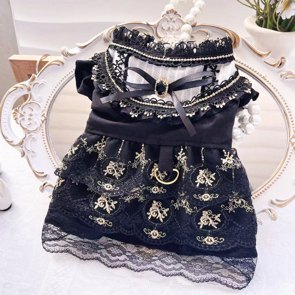 Golden gothic-style skirt costume for a small dog or cat on a mannequin.