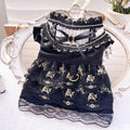 Golden gothic-style skirt costume for a small dog or cat on a mannequin.