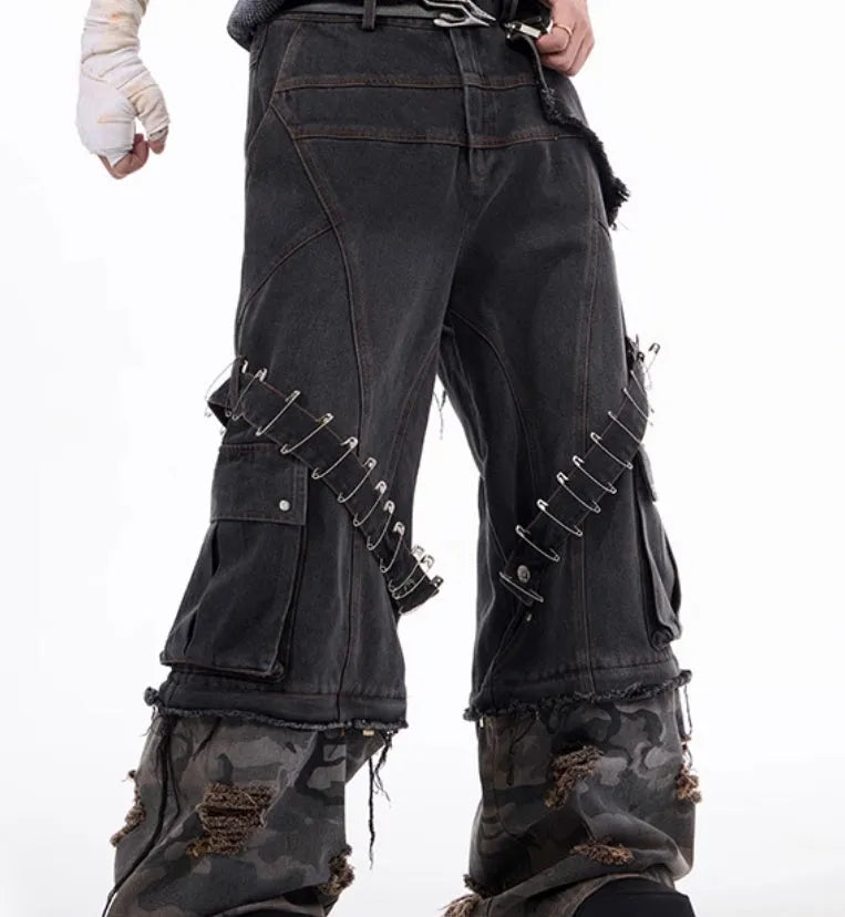 Grey men's jeans with camouflage pattern and ribbon splicing details on cotton denim.