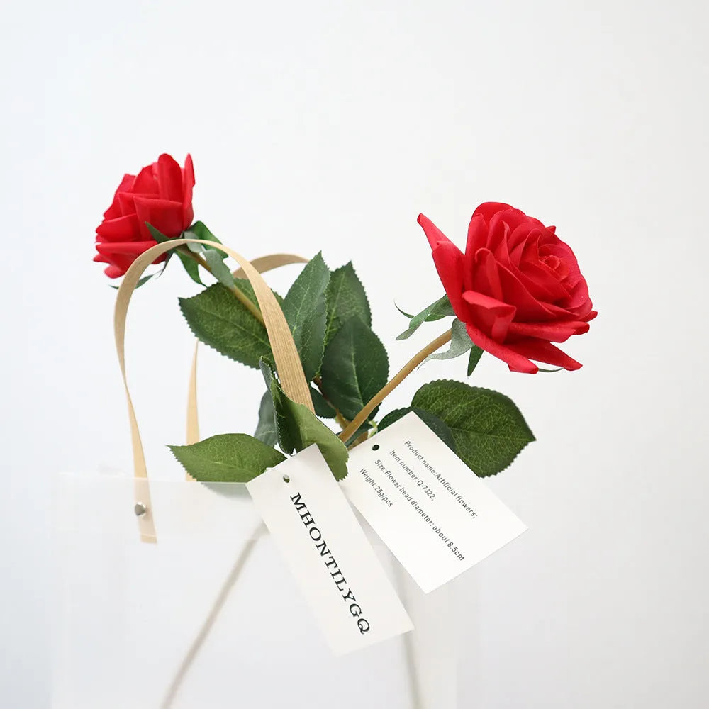 Silk artificial rose flower in red, 42cm long with 8.5cm fabric flower head on plastic stem.