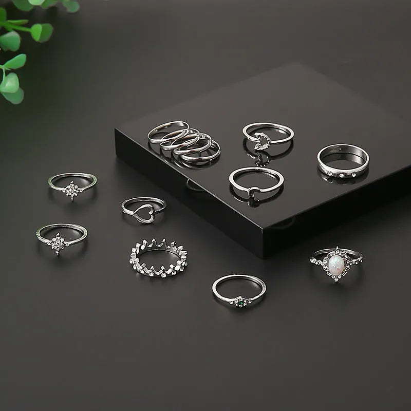 Vintage star moon rhinestone ring set of 13 pieces in gold and silver on display