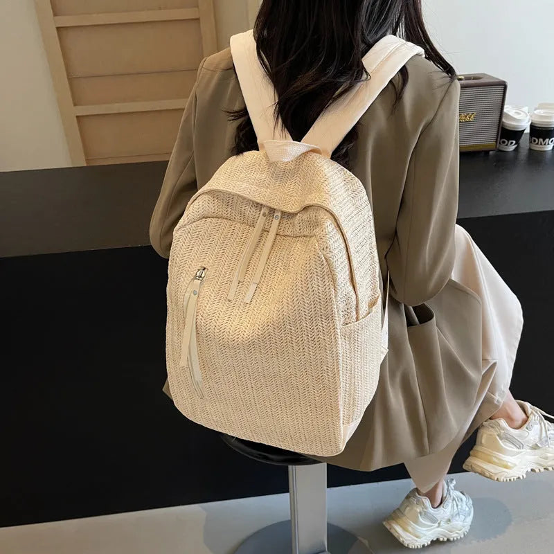 Minimalist waterproof polyester backpack for women in urban simplicity style with phone pocket