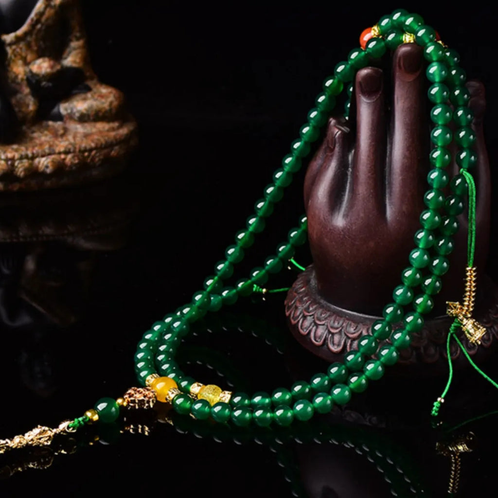 Handcrafted multi-strand bracelet with green agate beads from Brazil, showing size options.