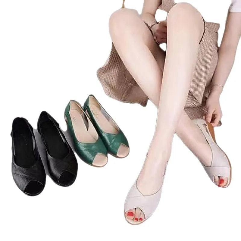 Women's black peep toe sandals with an ankle buckle strap and a rubber mid-heel sole.