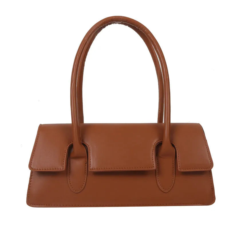 Women's small square shoulder bag in PU material showing stitching details and horizontal shape