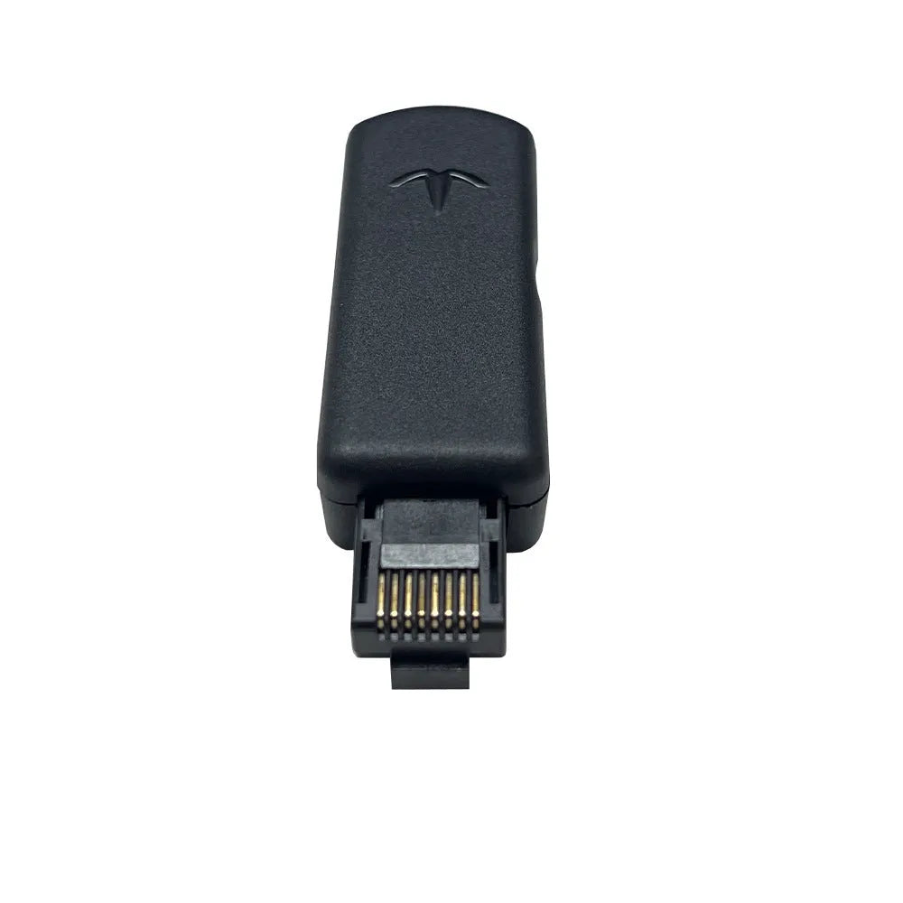 Black JB Tool USB adapter for PS5 console with Ethernet port, shown with USB cable.