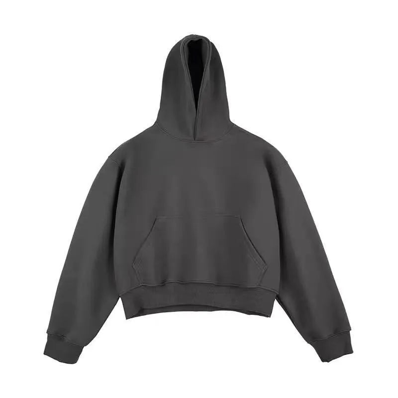 Man wearing a dark grey Chinese cotton hooded sweatshirt with a removable hood and long sleeves.
