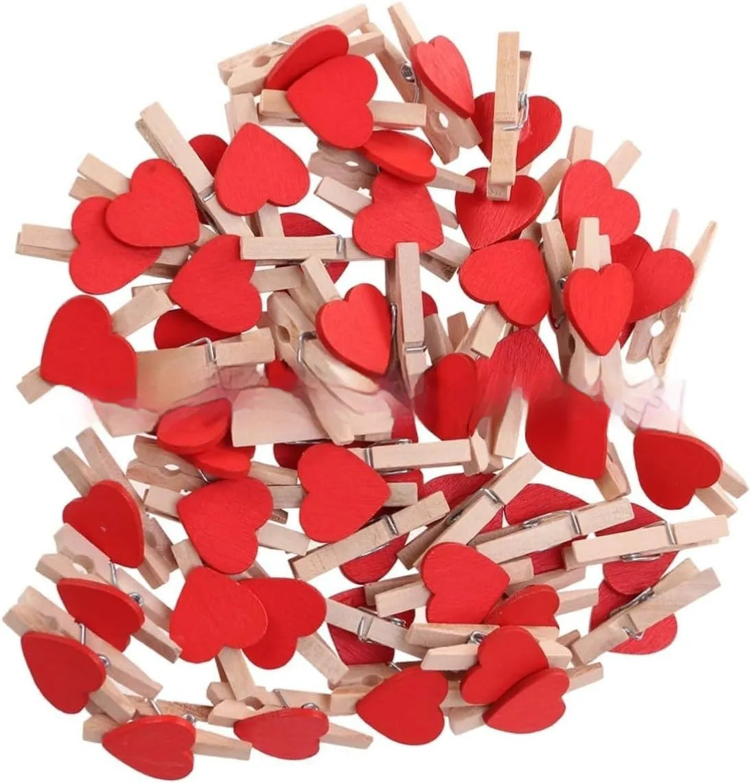 Set of five handmade solid wood heart-shaped clips in red, white, and rose red on a wooden surface.