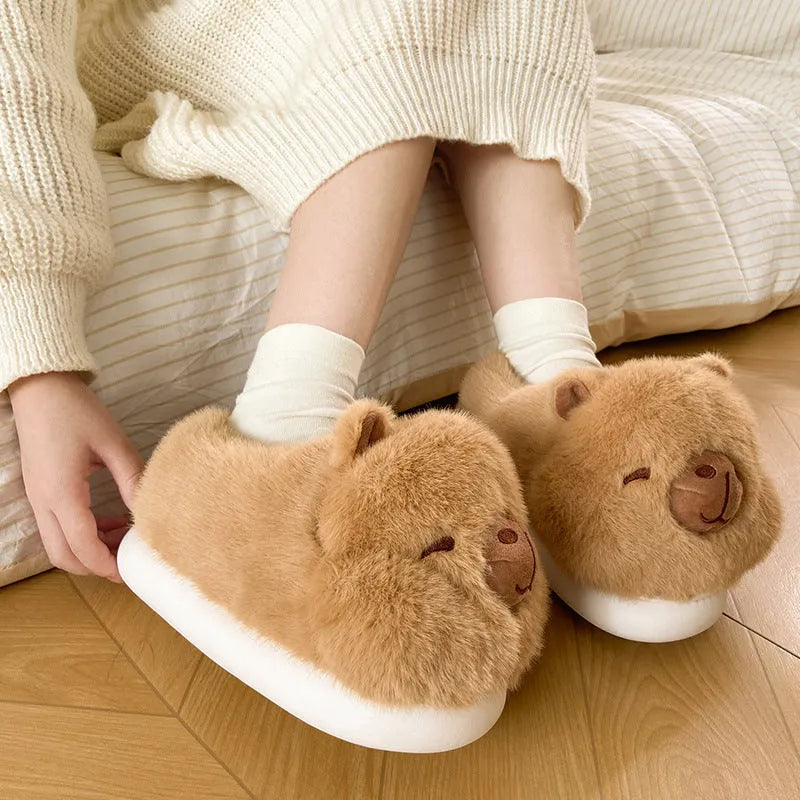 Light brown women's winter slippers with plush upper and artificial wool lining in adult sizes