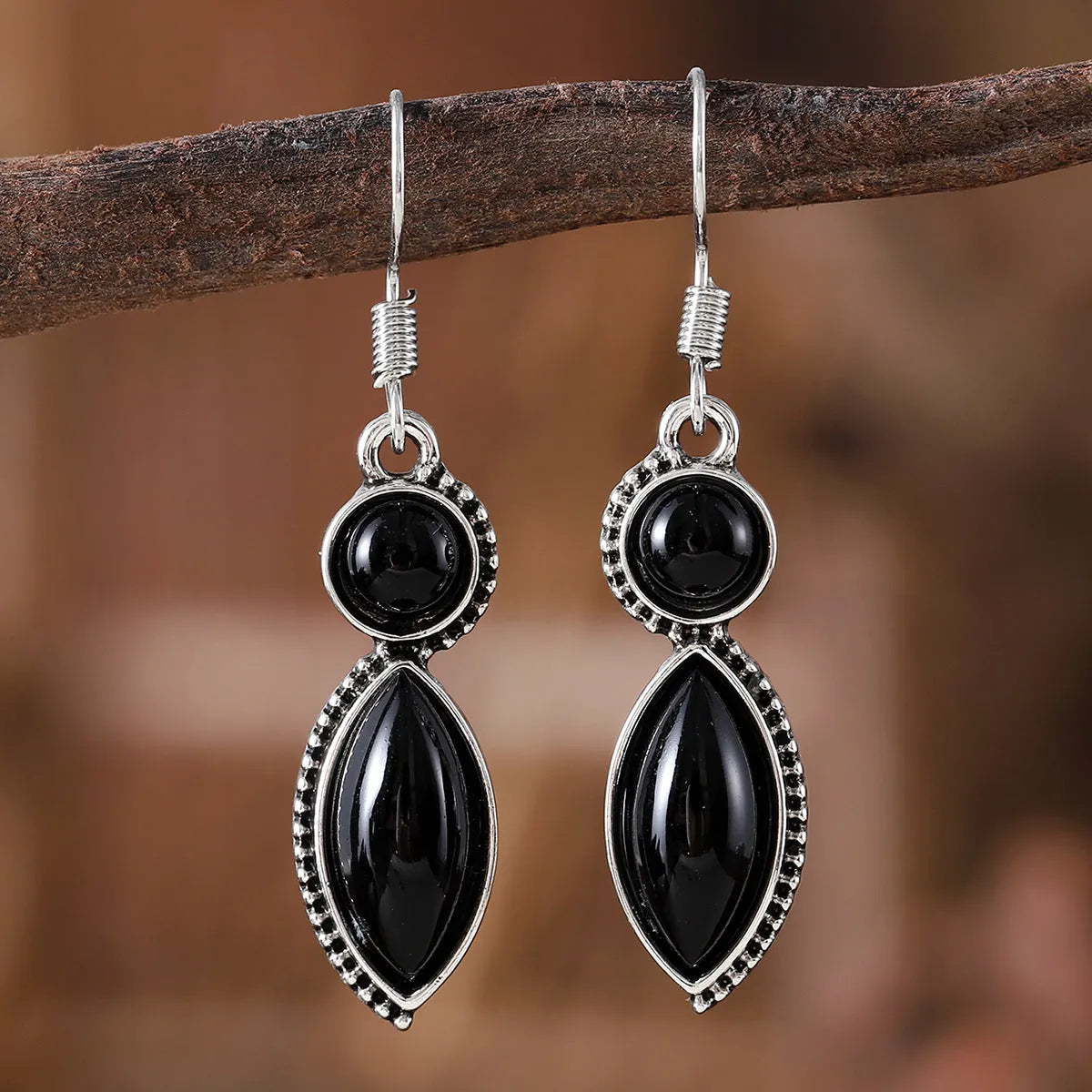 Black and purple geometric pendant earrings with round shapes and electroplated zinc alloy construction