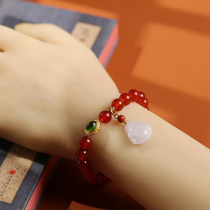 Handmade red agate and amber bracelet with Maitreya Buddha charm in Chinese geometric style.